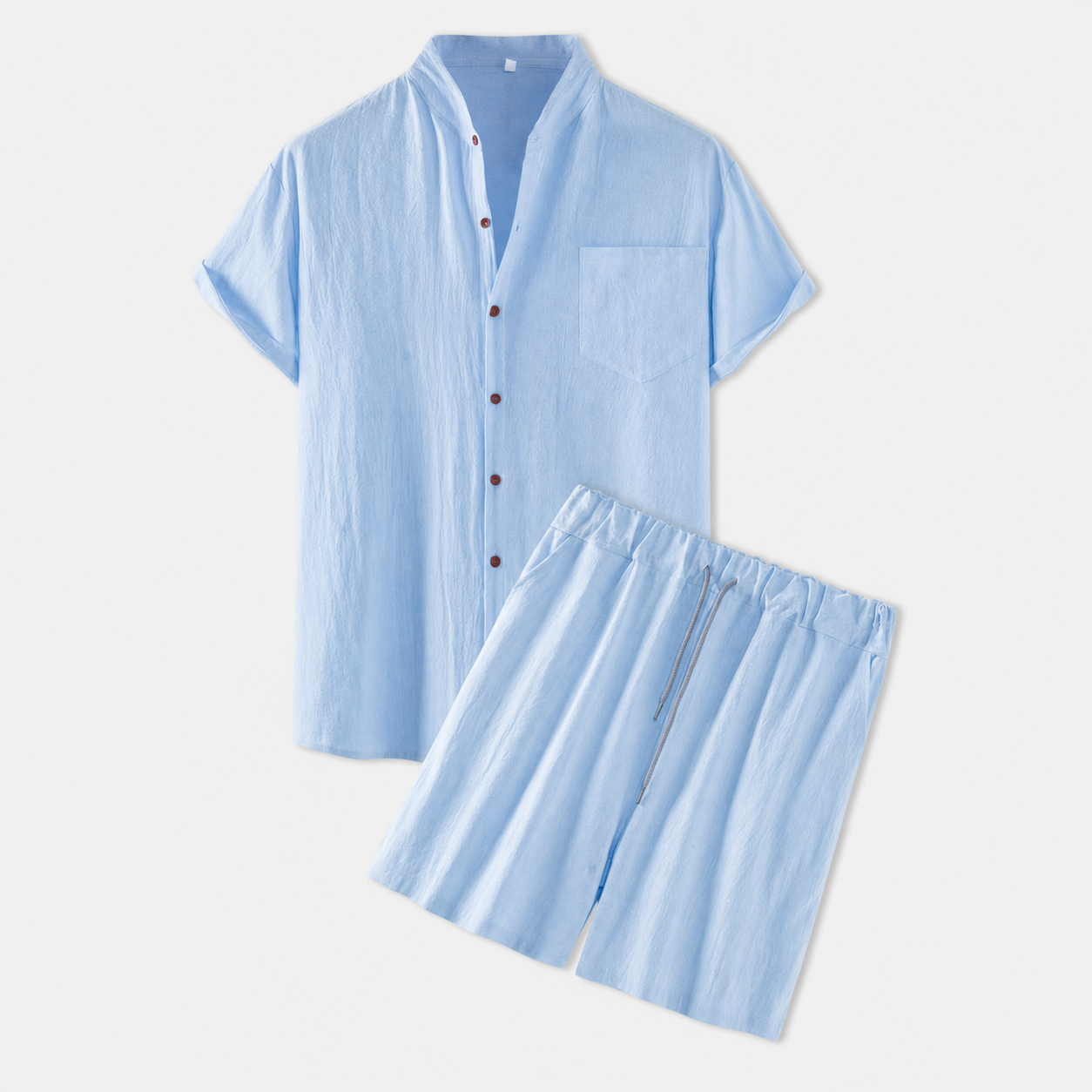 Completo Mare da uomo in lino azzurro con camicia a manica corta e shorts